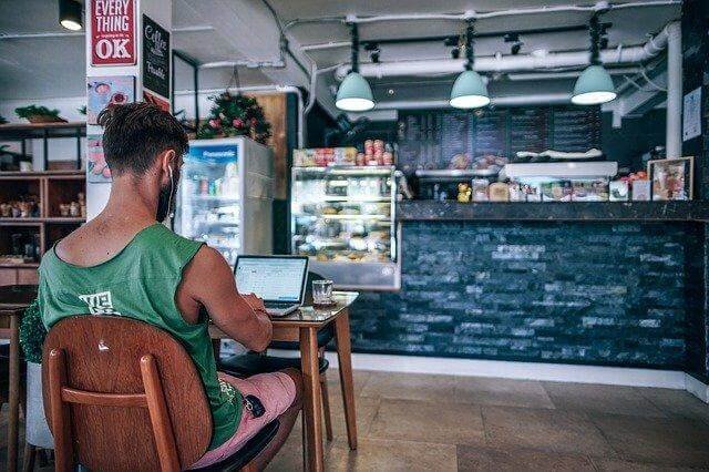 A person sitting at a table
Description automatically generated with low confidence